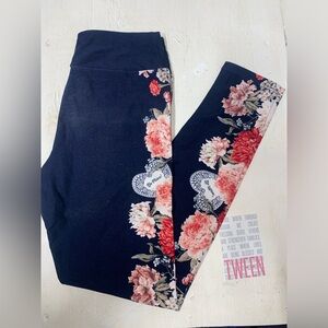 Navy Valentines capsule leggings by Lularoe. Tween size. USED. Normal wear.